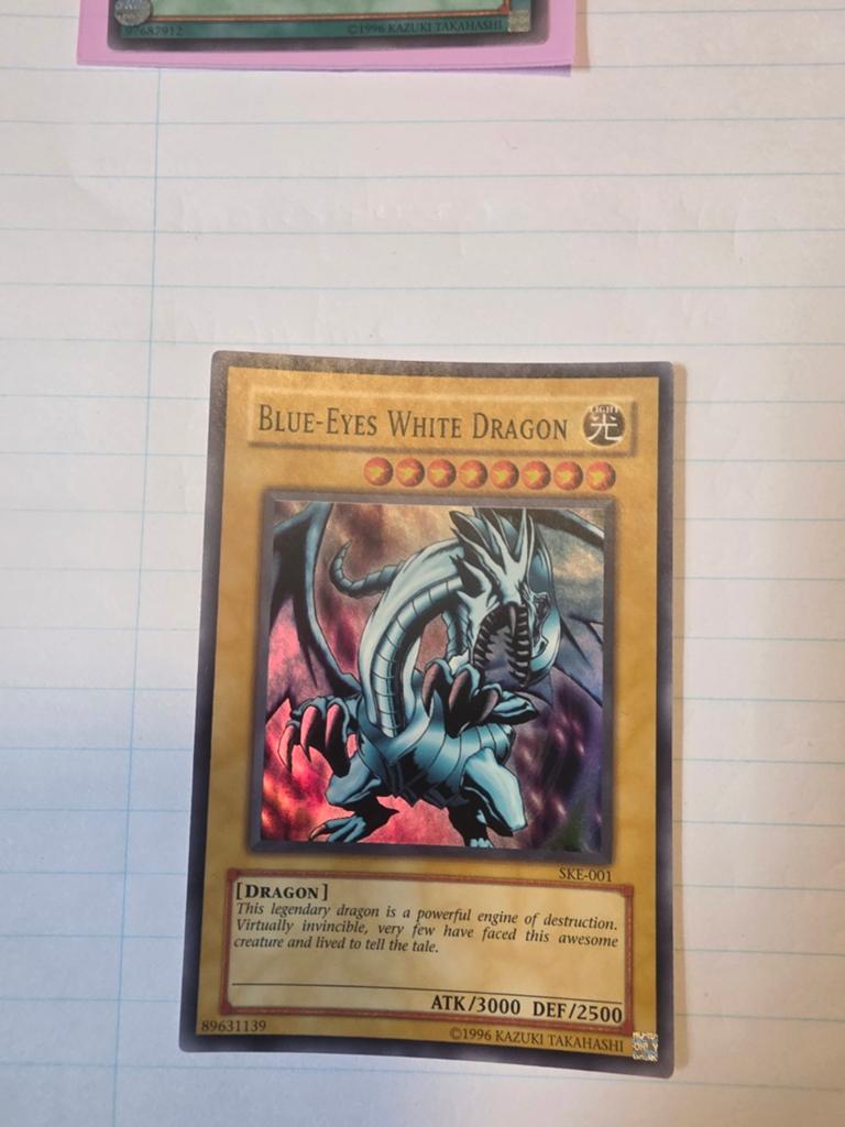Yu-Gi-Oh! Blue-Eyes White Dragon SKE-001, Ophalen, Gebruikt, Losse kaart, Foil