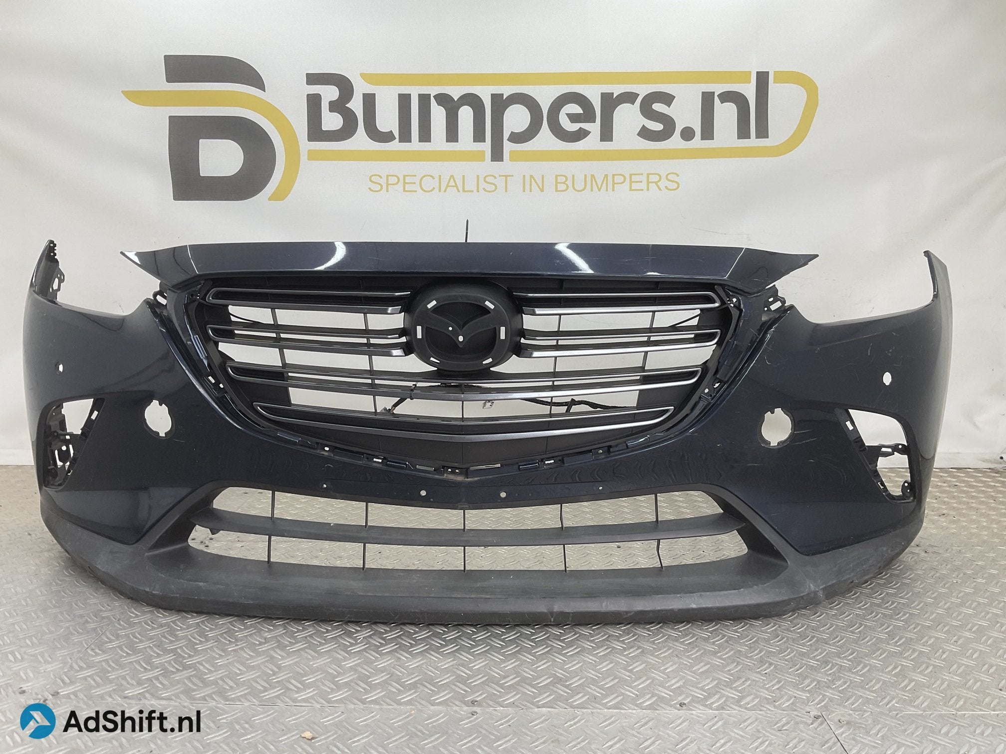 Bumper Mazda CX3 4xpdc 2015-2019 DK8A-50031 Voorbumper B5-23, Bumper