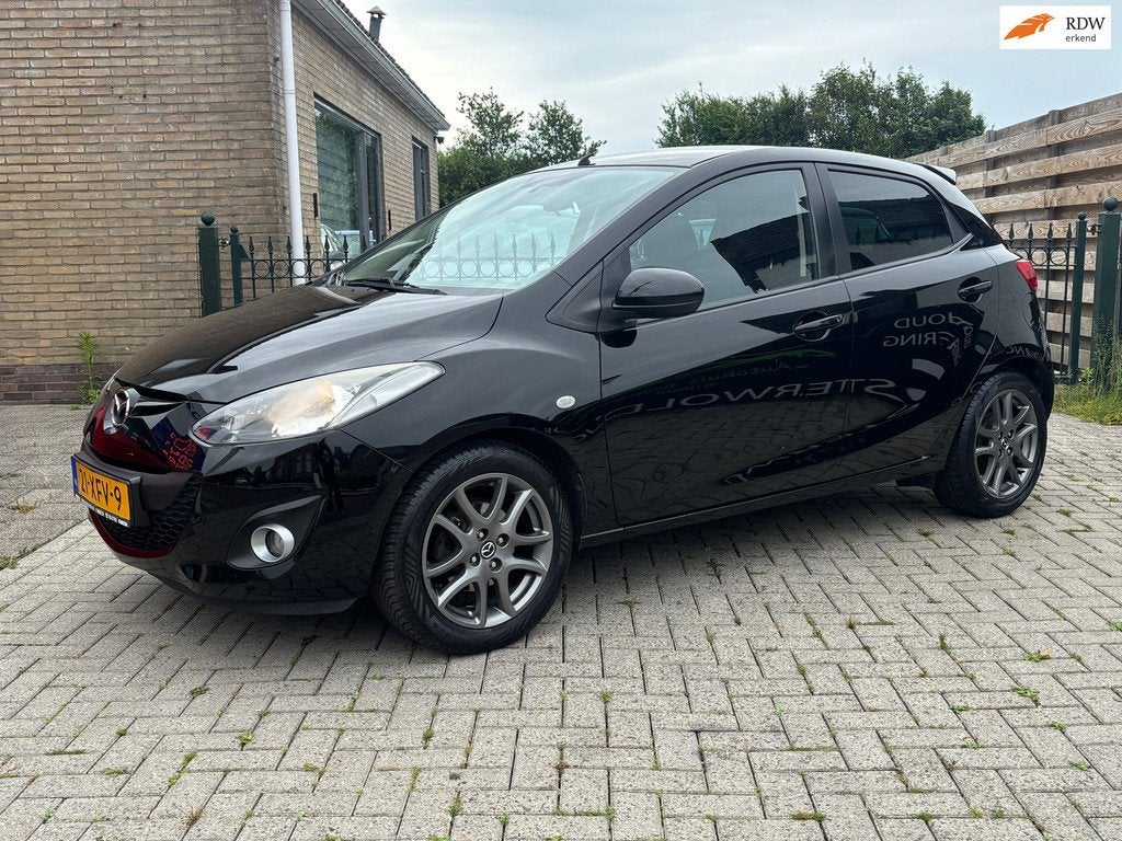 Mazda 2 1.3 BIFUEL Navigator GT | airco | cruise | trekhaak, Auto's, Mazda, Voorwielaandrijving, Euro 5, 4 cilinders, 4 stoelen