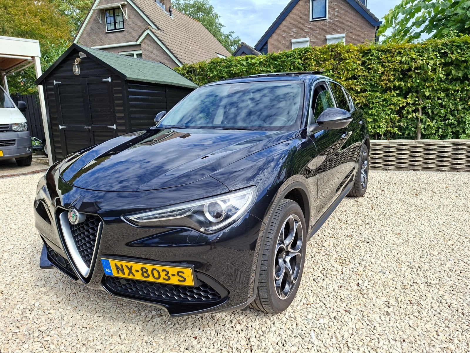 Alfa Romeo Stelvio 2.0 280pk AT AWD 2017 Zwart, Auto's, Automaat, 1995 cc, 4 cilinders, Zwart