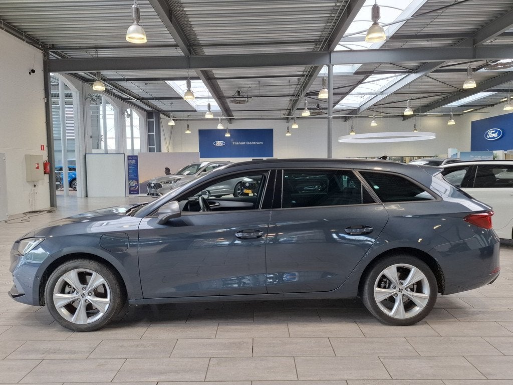 SEAT Leon Sportstourer 1.5 TSI e-Hybrid 204pk FR Business |, Auto's, Seat, 12 maanden, 4 cilinders, Leder en Stof, 1616 kg