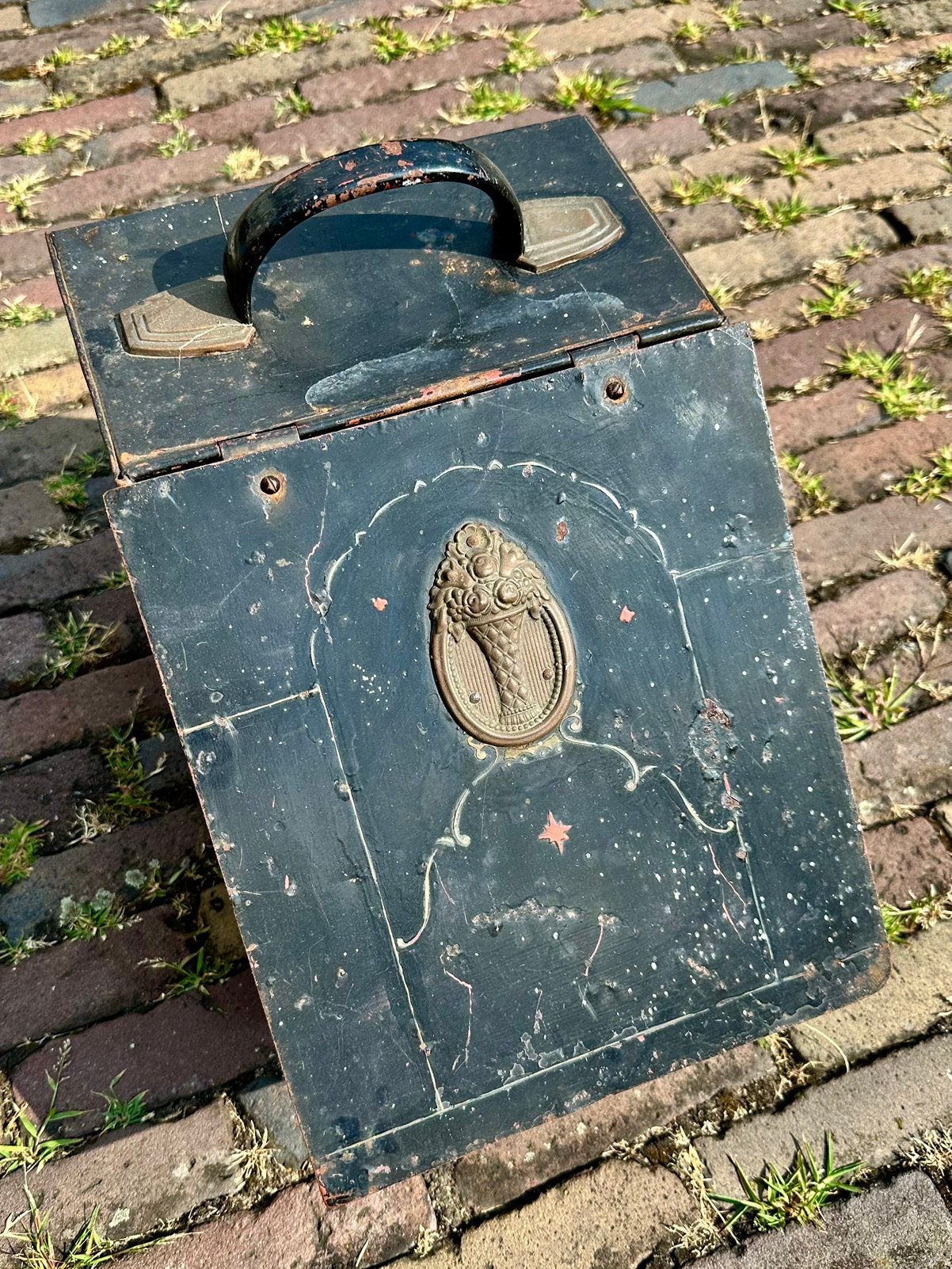Kolenkit zwart antiek 1930, Ophalen