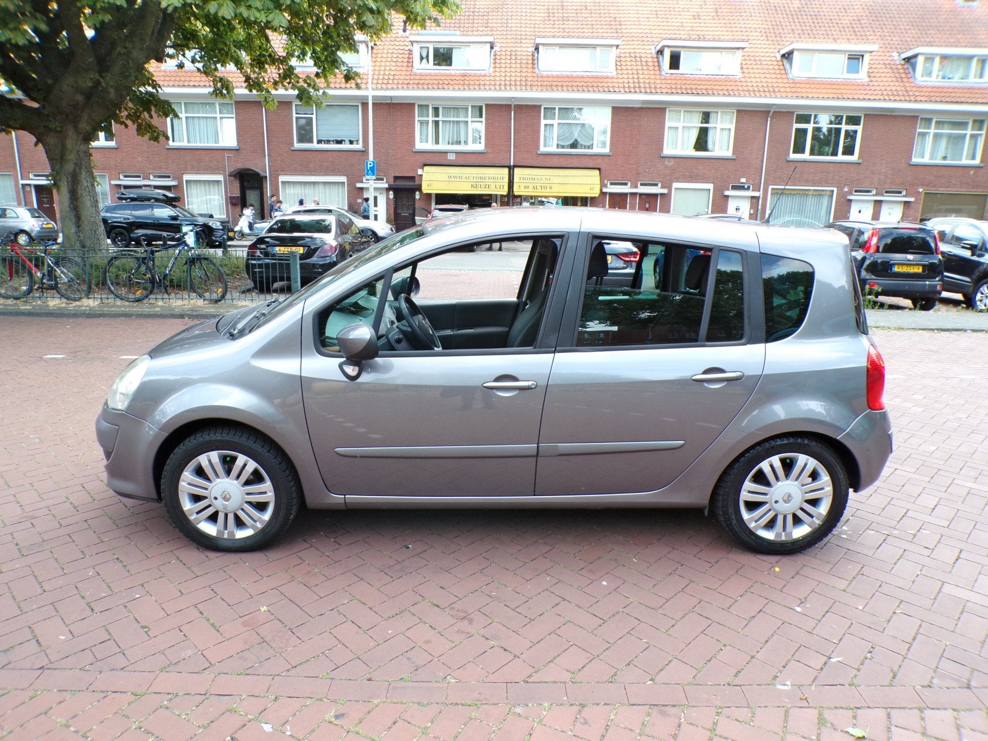 Renault Grand Modus 1.2 TCE Exception (bj 2011), Auto's, Voorwielaandrijving, Euro 5, Gebruikt, Metallic lak