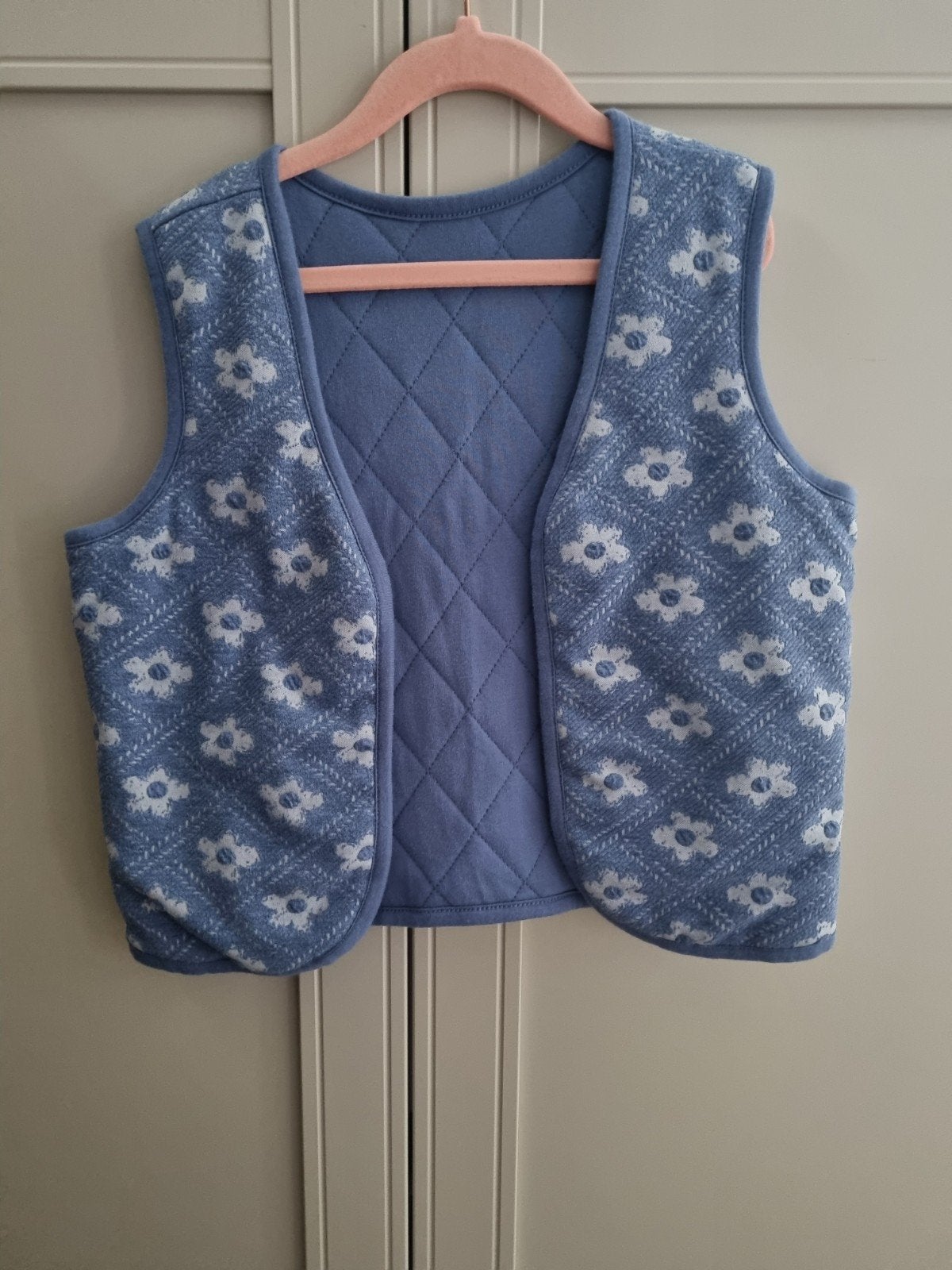 Blauw gilet maat 134/140, Ophalen of Verzenden, Nieuw, WE Fashion, Meisje