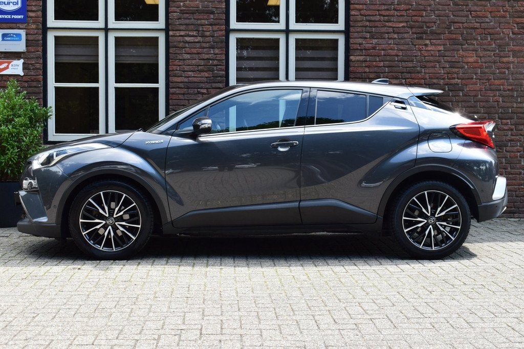 Toyota C-HR 1.8 Hybrid Executive Camera | Keyless | Stoelver, Auto's, Toyota, 4 cilinders, Met garantie (alle), Leder en Stof