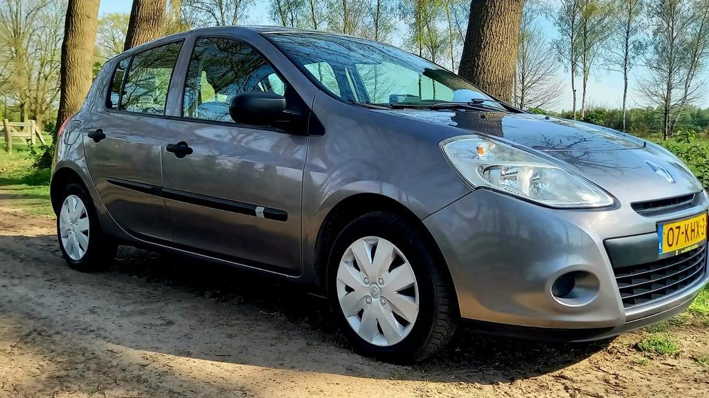 Renault Clio 1.2 16V 55KW 5-DRS E4 2010 Grijs, Voorwielaandrijving, Stof, Elektrische ramen, 4 cilinders