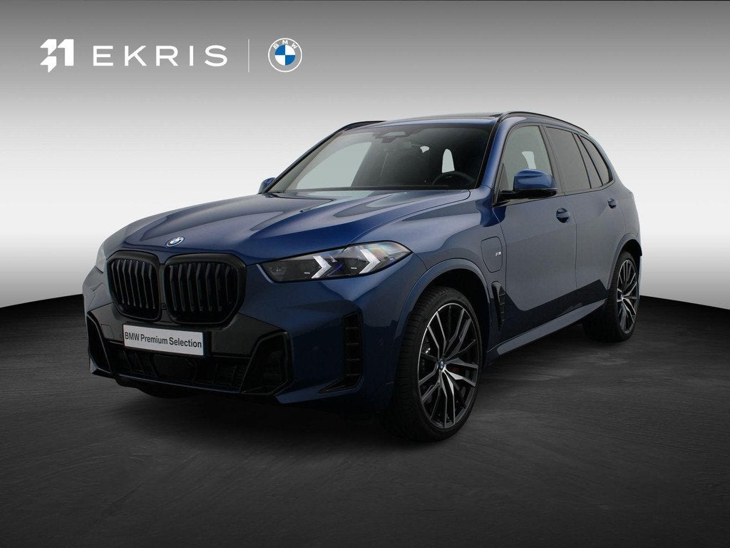 BMW X5 xDrive50e M Sportpakket Pro | Travel Pack | Innovatio, Gebruikt, 2395 kg, Met garantie (alle), Blauw