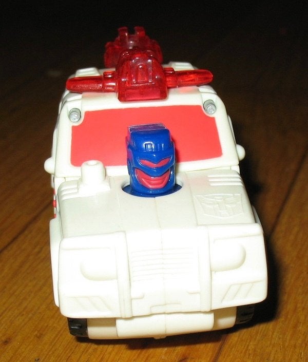 Transformers 2002 mcdonalds wit-rode auto 9x6cm, Verzamelen, Transformers, G1, Ophalen of Verzenden, Gebruikt