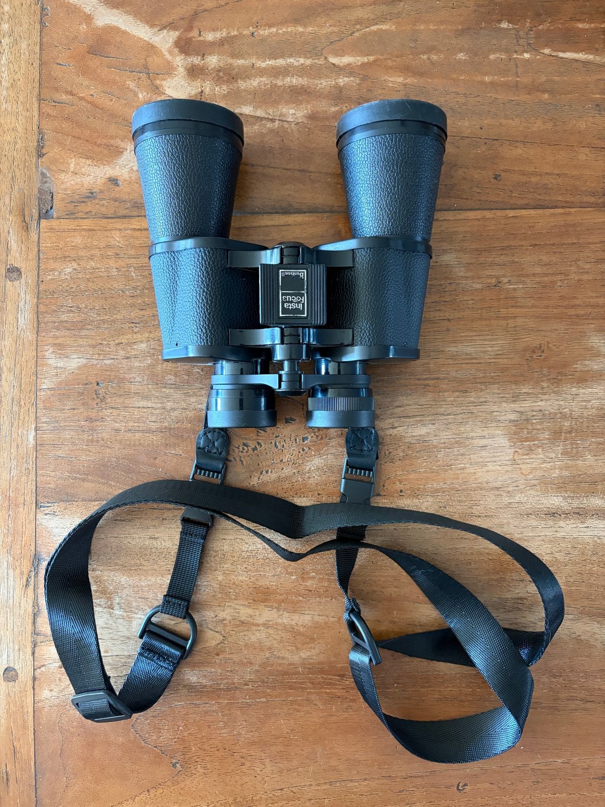 Bushnell Falcon 10x50 verrekijker met tas en draagriem, Gebruikt, 8 tot 12x, Met hoes of tas, Porro (met knik)