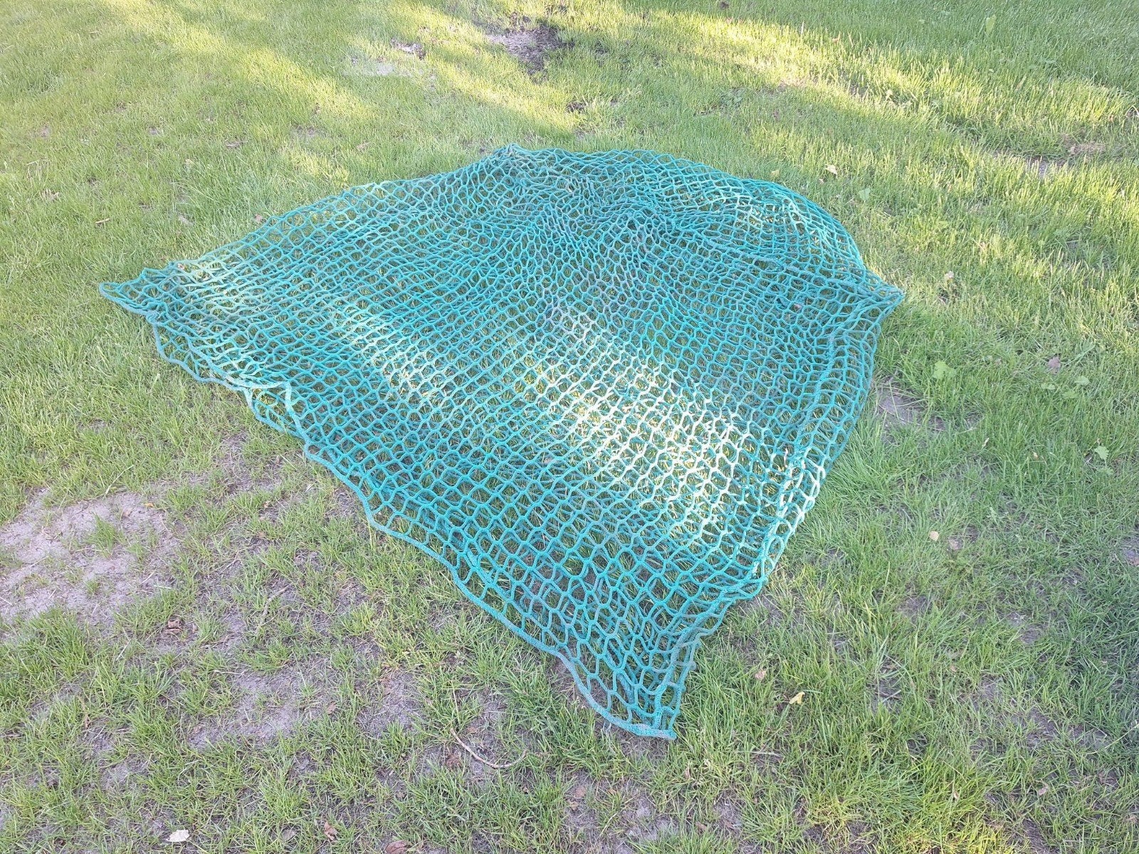 Hooibaal net, Ophalen, Kat