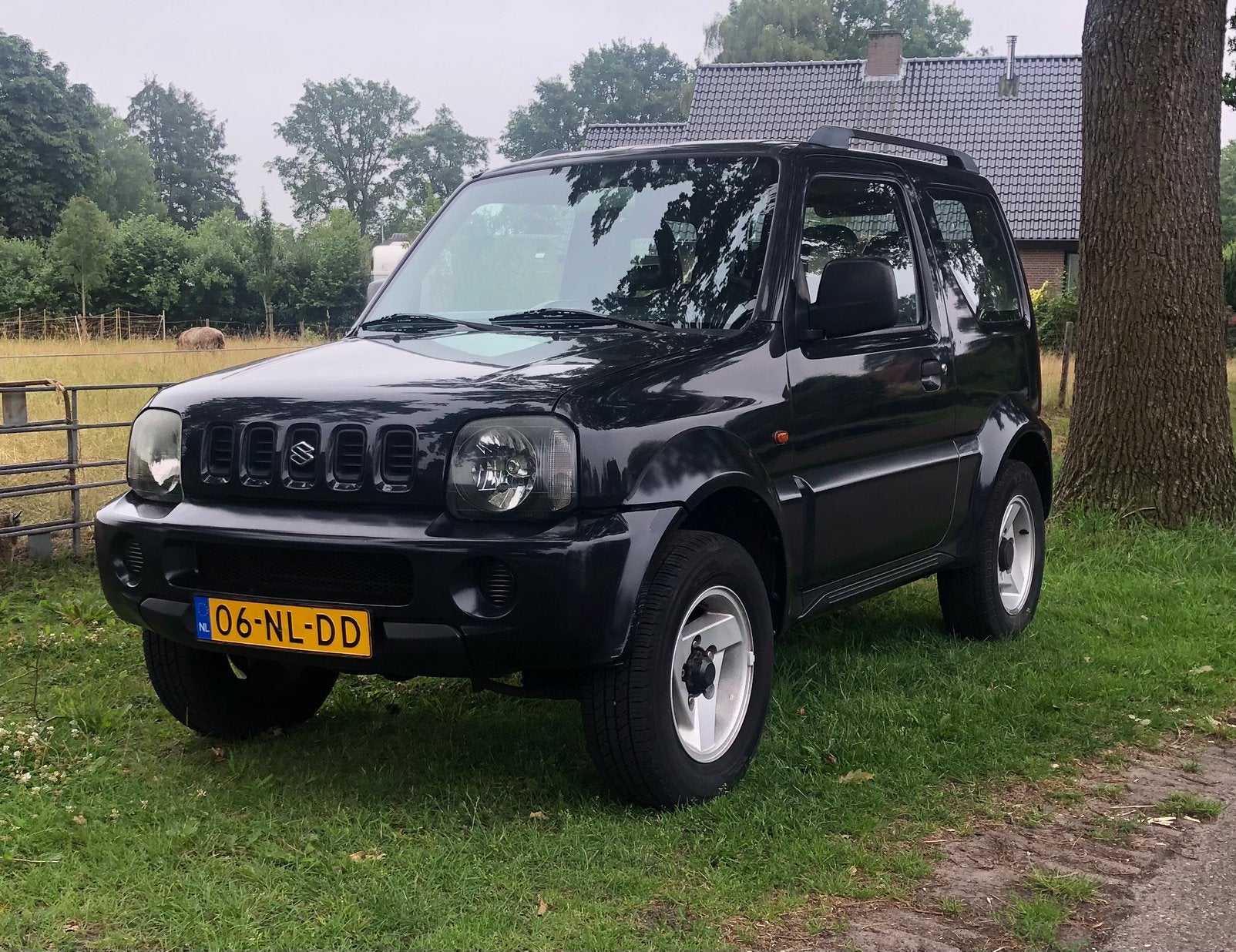 Suzuki Jimny 1.3 JX 4WD 2003 Zwart, Auto's, Suzuki, 13 km/l, Stof, 40 €/maand, 4 cilinders