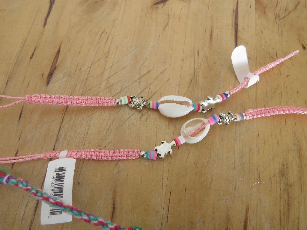 stel vrienschapsbandjes met iets van een schelp, Ophalen of Verzenden, Nieuw, Overige kleuren, Overige materialen