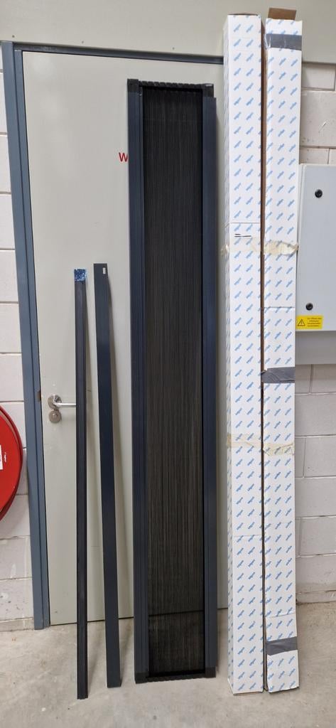 Unilux plissehordeur, nieuw, 2 stuks, antraciet., Ophalen, Hordeur, Nieuw, Schuifdeur