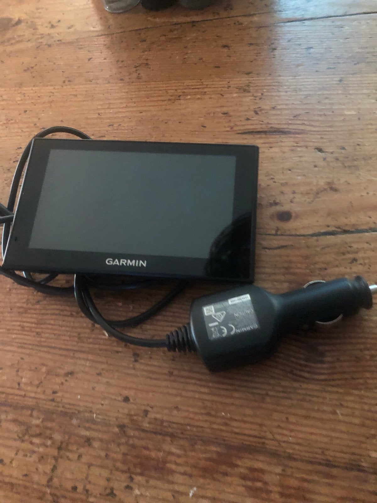 Ouder Garmin navigatiesysteem met autolader, Auto diversen, Ophalen of Verzenden, Gebruikt