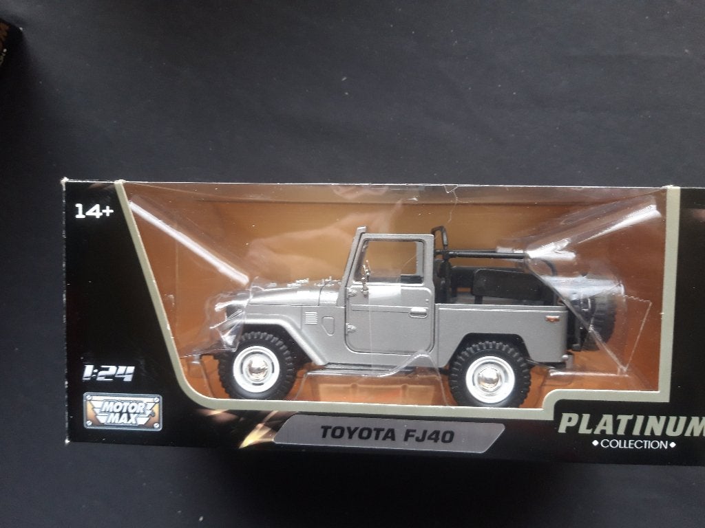 Toyota Land Cruiser FJ40 grijs Motormax 1:24, Ophalen of Verzenden, Zo goed als nieuw, Auto, Motormax