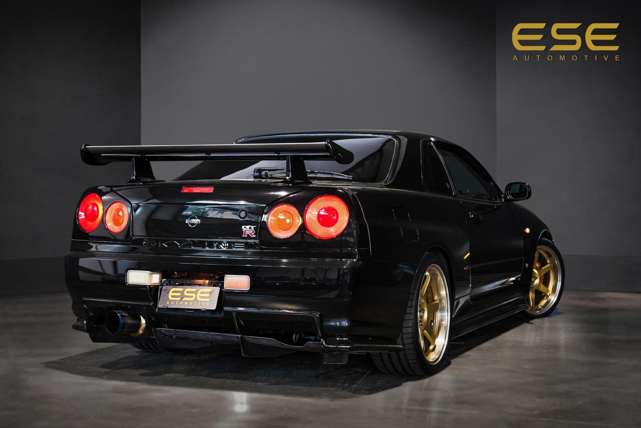 Nissan Skyline R34 GTR V-spec LHD (UK-Spec) 1 of 80, Stof, Zwart, 2568 cc, Zwart