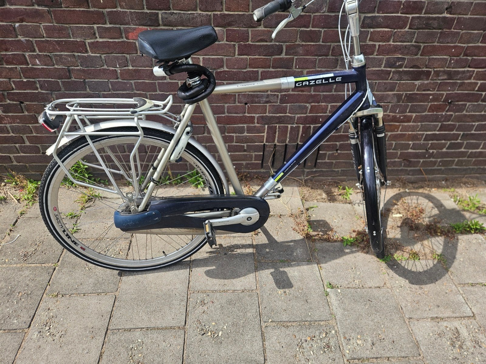 Goed onderhouden oragje Gazelle chamonix te koop., Fietsen en Brommers, Ophalen, Gebruikt, Gazelle