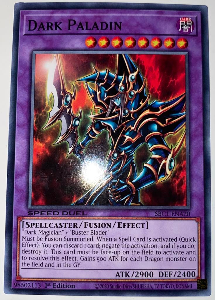 Yu-Gi-Oh! Dark Paladin SBC1 1st Edition !, Hobby en Vrije tijd, Verzamelkaartspellen | Yu-gi-Oh!, Ophalen of Verzenden, Zo goed als nieuw