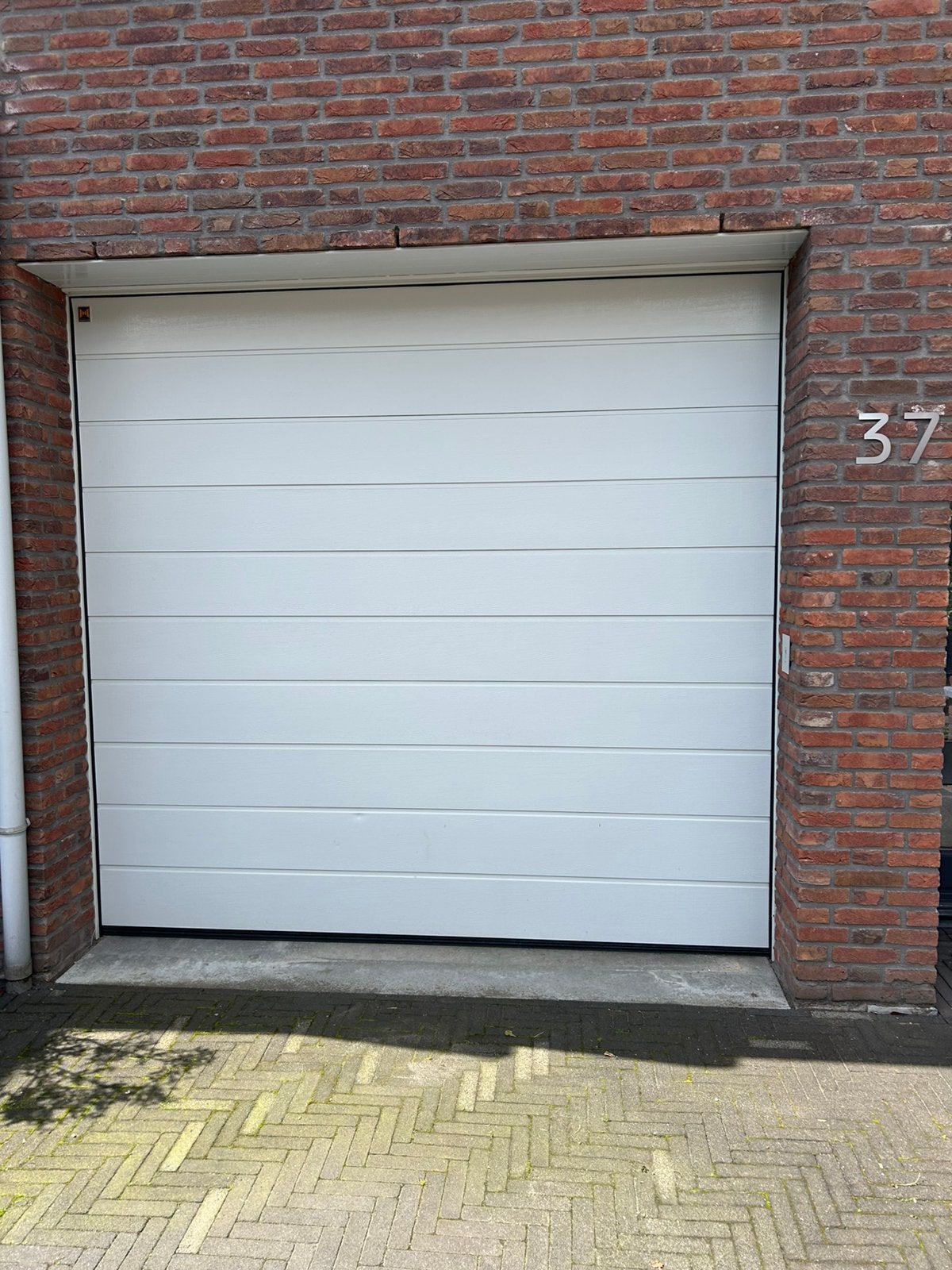 Te koop elektrische garagedeur, Ophalen, Gebruikt, 200 cm of meer, Wit