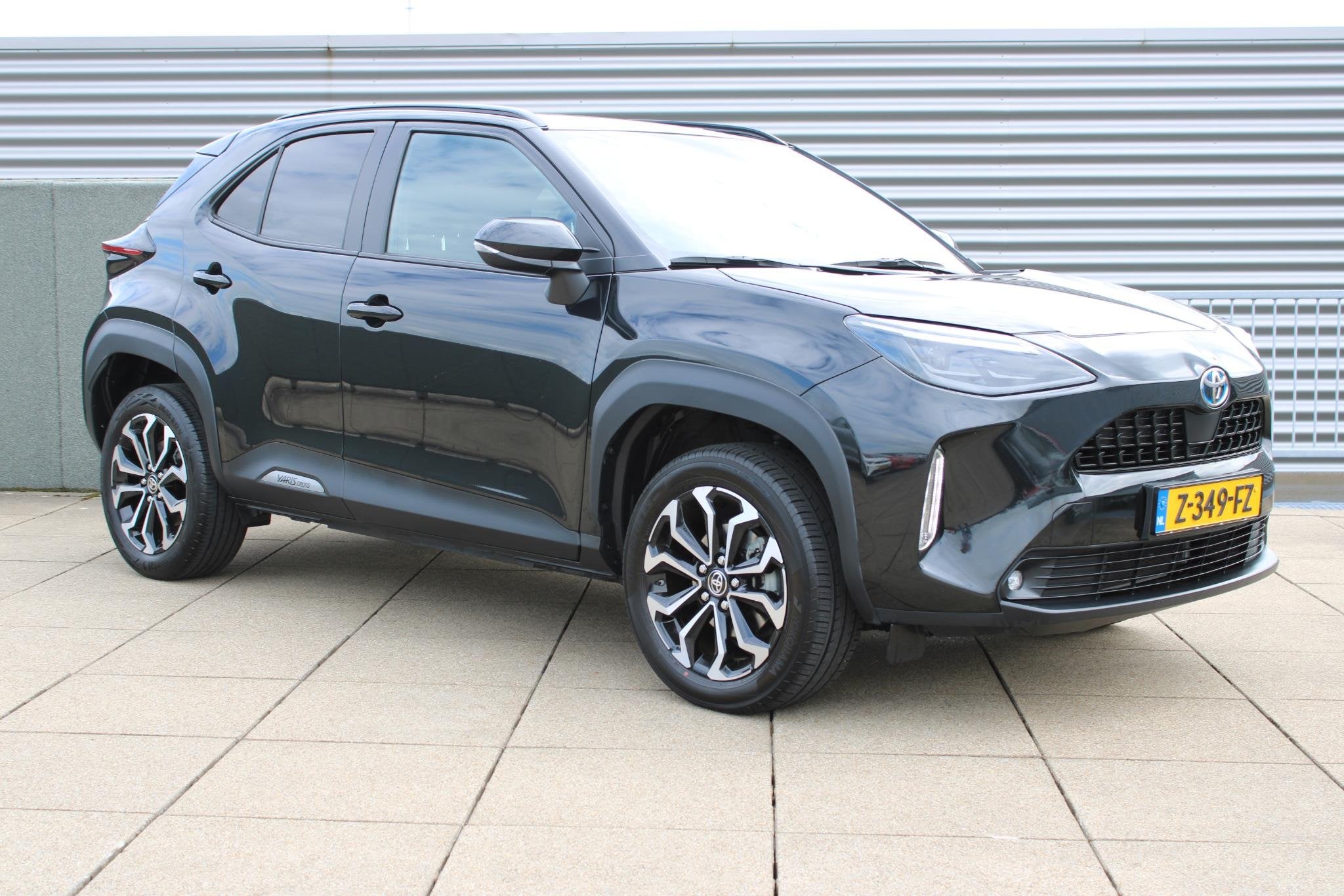 Toyota Yaris Cross 1.5 Hybrid Dynamic, Stof, Gebruikt, 116 pk, Bedrijf