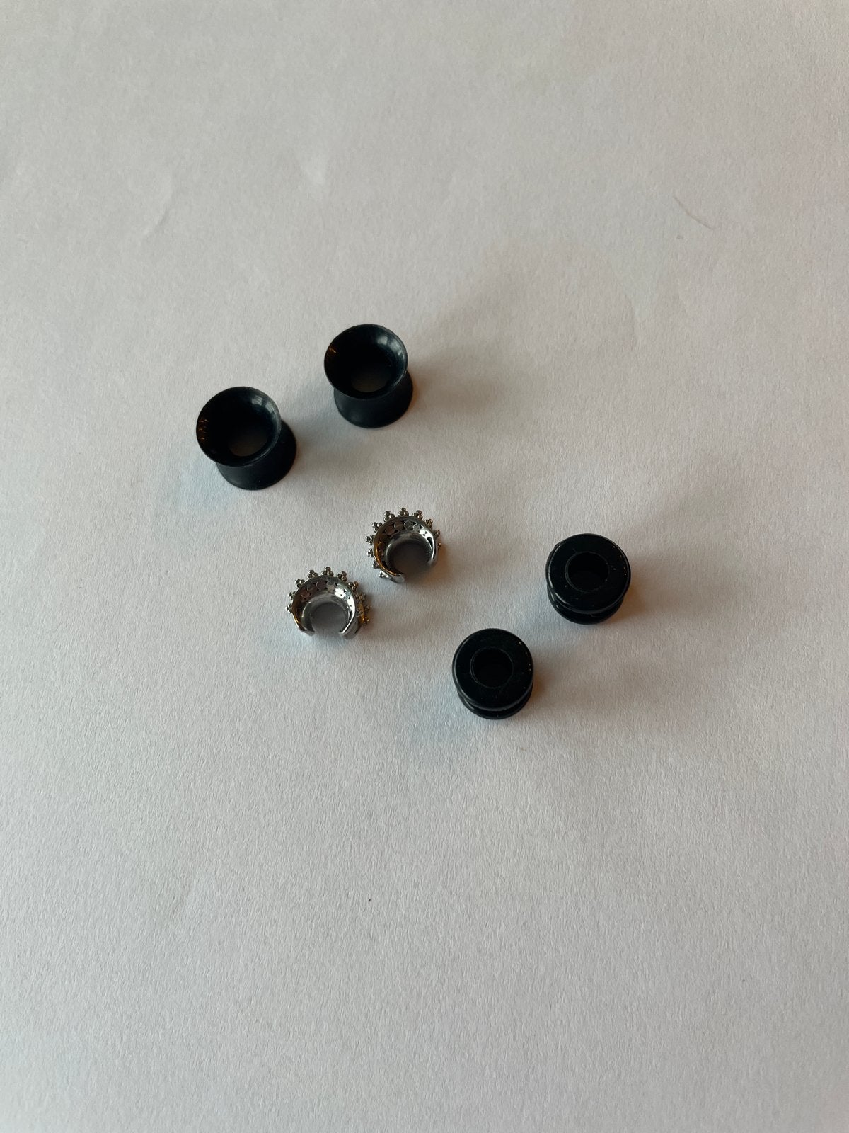 Set van 3 tunnels (8mm) - flexibel en RVS, Ophalen of Verzenden, Gebruikt, Overige materialen, Oor- of Traguspiercing