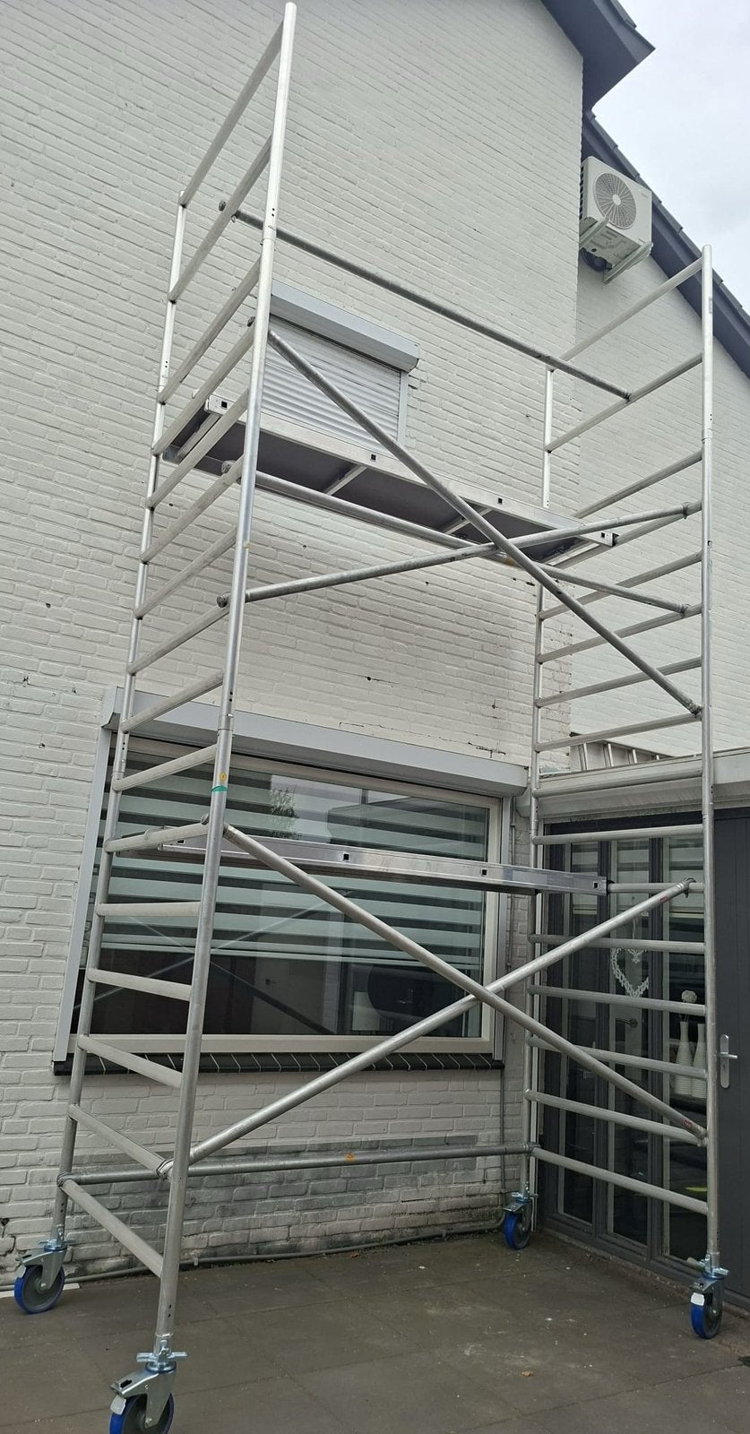 Rolsteiger 6.2 mtr werkhoogte ZGAN, Doe-het-zelf en Verbouw, Steigers, Ophalen, Zo goed als nieuw, Rolsteiger of Kamersteiger