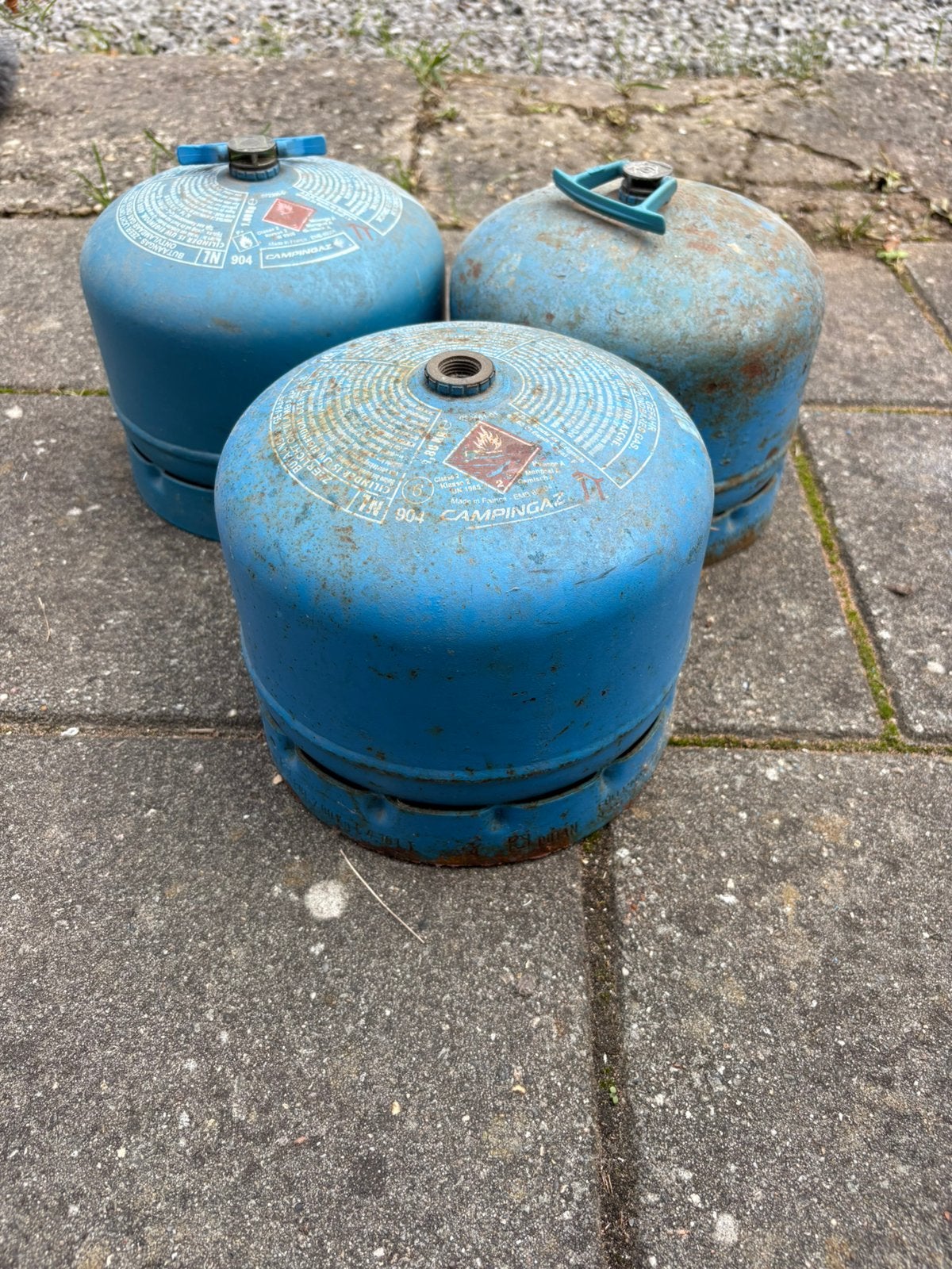 Lege camping gas flessen, Ophalen, Gebruikt