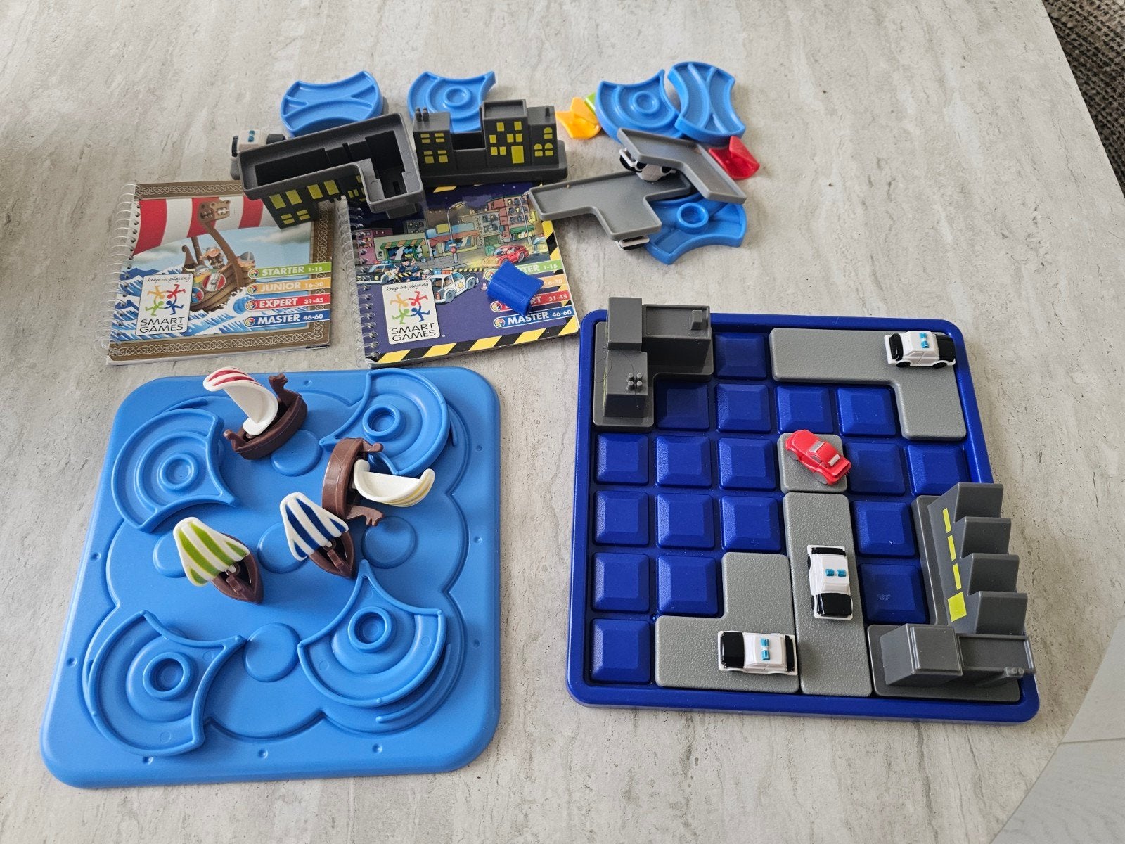 SmartGames Rush Hour en Waterworld - 2 spellen, Hobby en Vrije tijd, Een of twee spelers, Ophalen of Verzenden, Gebruikt, SmartGames