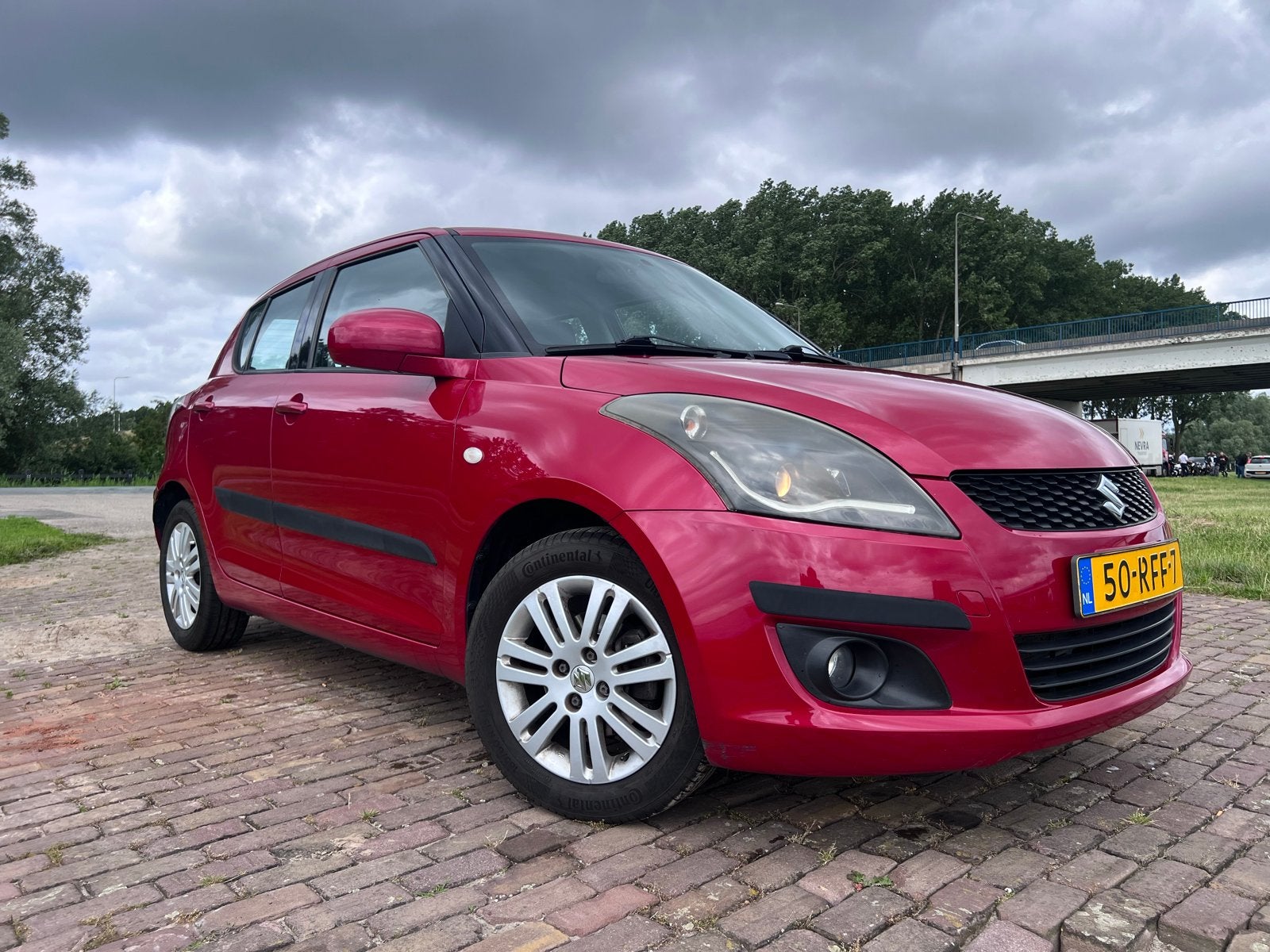 Suzuki Swift 1.2 5-D 2011 Rood, Auto's, Suzuki, Voorwielaandrijving, Euro 5, Stof, 4 cilinders