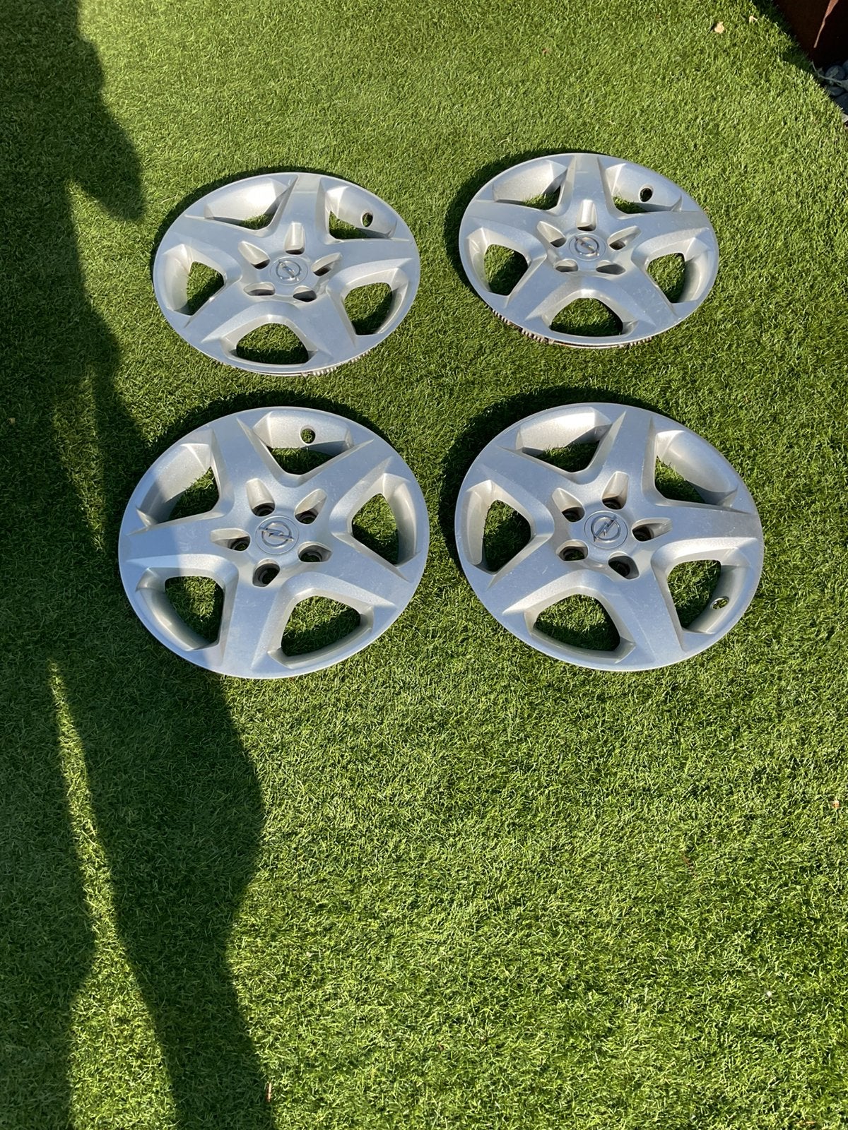 4 Originele Opel Wieldoppen, Auto diversen, Wieldoppen, Ophalen, Zo goed als nieuw