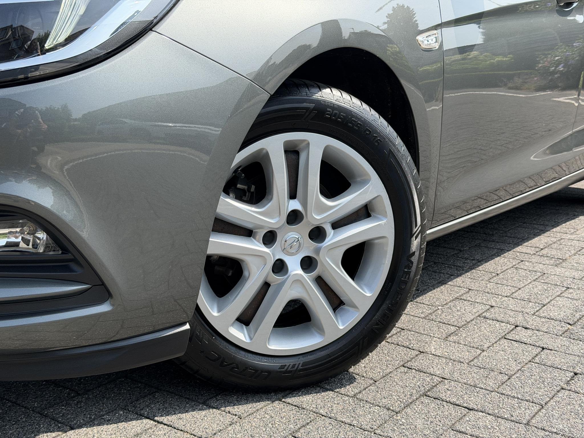 Opel Astra Online Edition 1.0 105PK Navigatie, Parkeersensor, Auto's, Stof, Gebruikt, 23 km/l, Origineel Nederlands