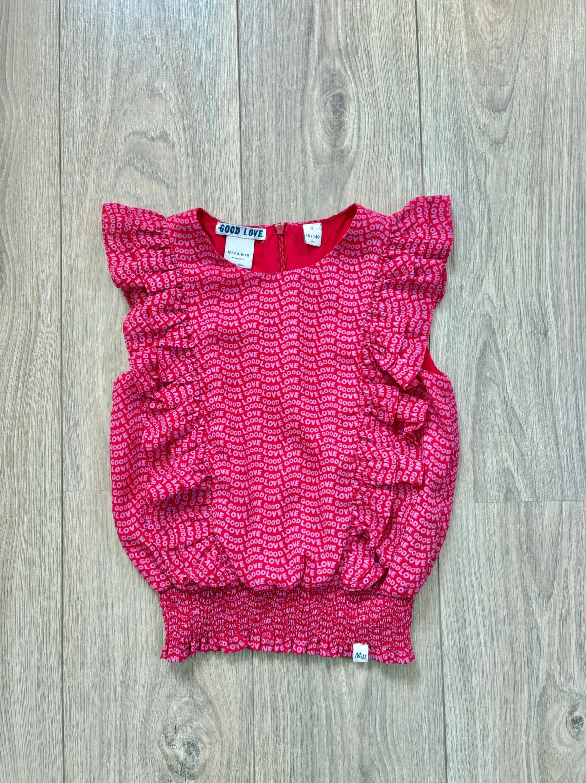 Leuke NIK&NIK top - maat 10/140, Kinderen en Baby's, Kinderkleding | Maat 140, Ophalen of Verzenden, Zo goed als nieuw, Meisje