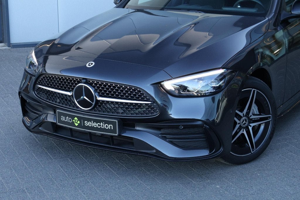 Mercedes-Benz C-klasse 300 e 4MATIC AMG Line / Memory / Trek, Auto's, Mercedes-Benz, Automaat, 4 cilinders, Plug-in hybride, Bedrijf