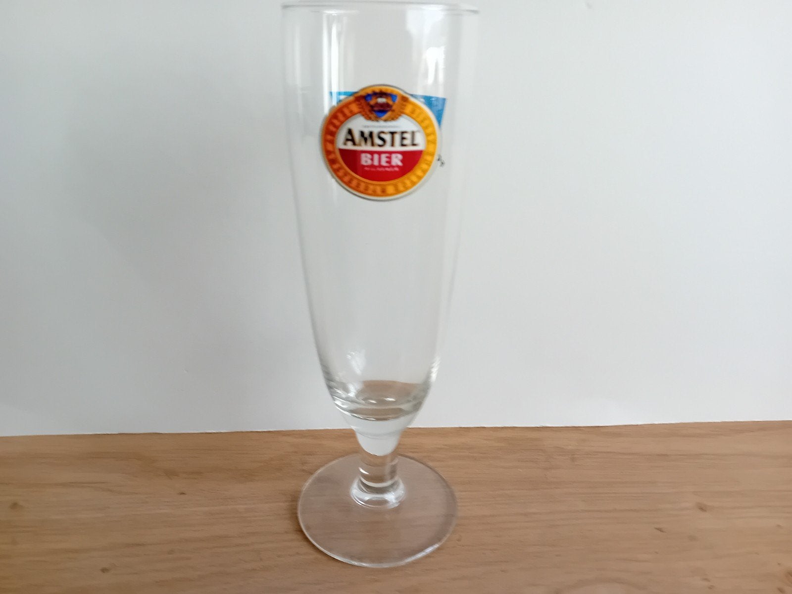 Amstel voetglas met achteropdruk FC Den Bosch, Ophalen of Verzenden, Amstel