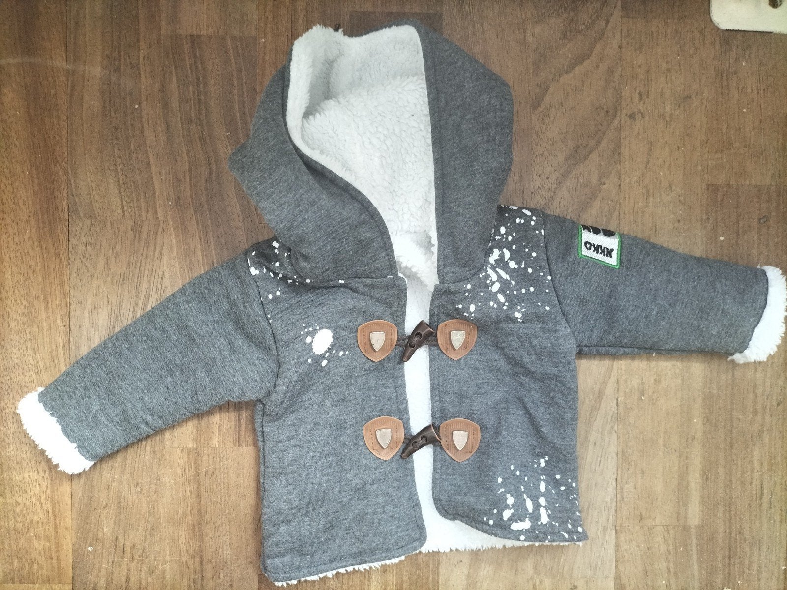 Grijs baby jasje merk: Jikko €7,50, Ophalen of Verzenden, Jongetje of Meisje, Jasje
