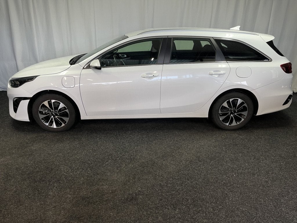 Kia Ceed Sportswagon 1.6 GDI PHEV PLUG-IN DynamicLine 1E EIG, Auto's, Gebruikt, Met garantie (alle), Wit, Plug-in hybride