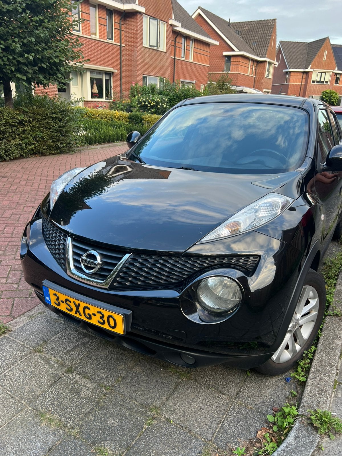 Nissan Juke 1.6 Eco 117pk 2013 Zwart, Auto's, 1250 kg, 4 cilinders, Origineel Nederlands, Handgeschakeld