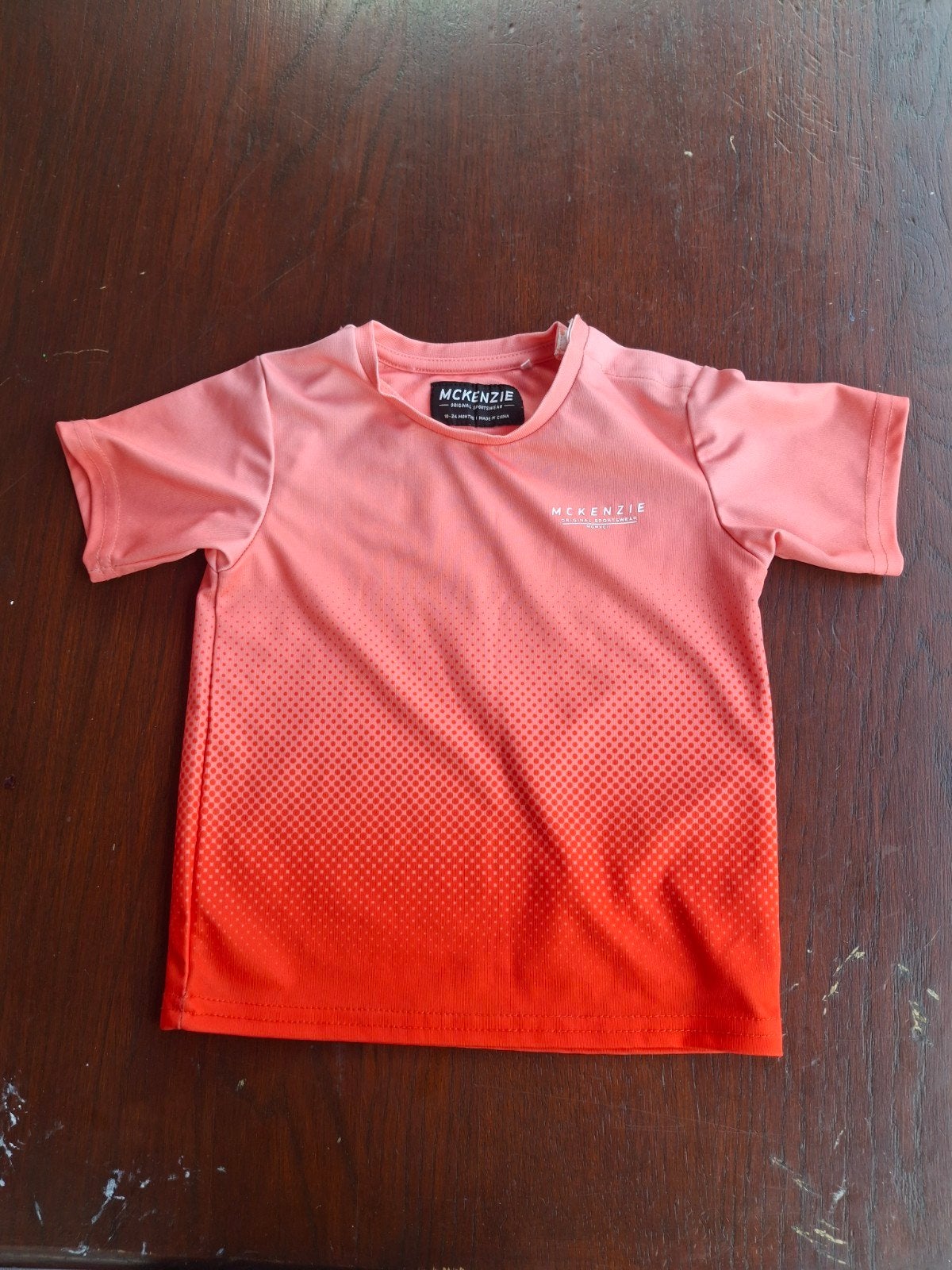McKenzie Sportshirt 18-24m – Roze/Oranje Gradient, Kinderen en Baby's, Ophalen of Verzenden, Gebruikt, McKenzie, Jongen of Meisje