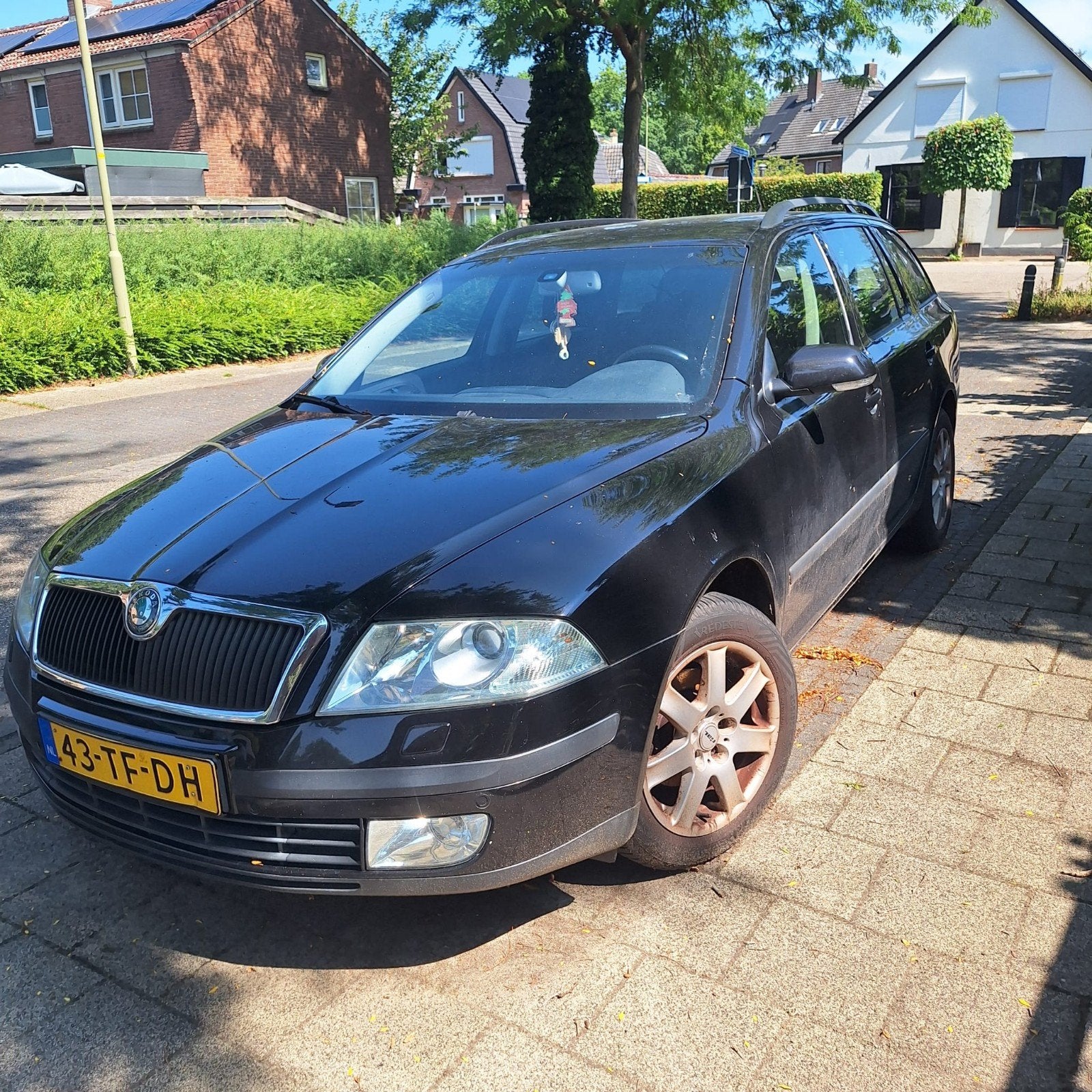 Skoda Octavia 1.6 Combi FSI 85KW 2006 Zwart, Auto's, Voorwielaandrijving, 15 km/l, 4 cilinders, Zwart
