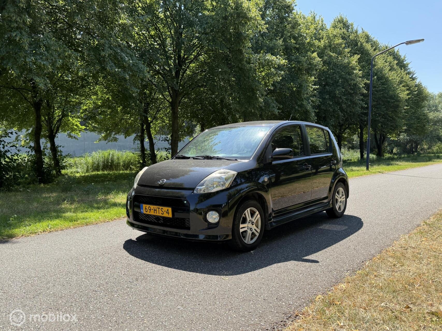 Daihatsu Sirion 2 1.3-16V Sport*AIRCO*ELEK. RAMEN*APK 01/27, Auto's, Daihatsu, Stof, Gebruikt, 4 cilinders, Zwart