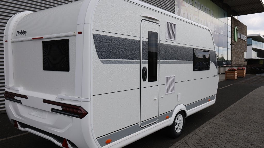 Hobby De Luxe 460 SFF ACTIEPRIJS, Caravans en Kamperen, Hobby, Bedrijf, Treinzit, Tot en met 3