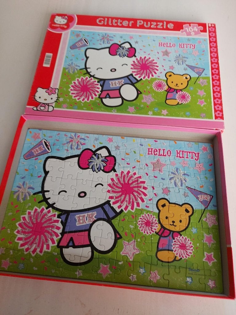 Hello kitty glitter puzzel 104 stukjes, Ophalen of Verzenden, Meer dan 50 stukjes, Gebruikt, 6 jaar of ouder