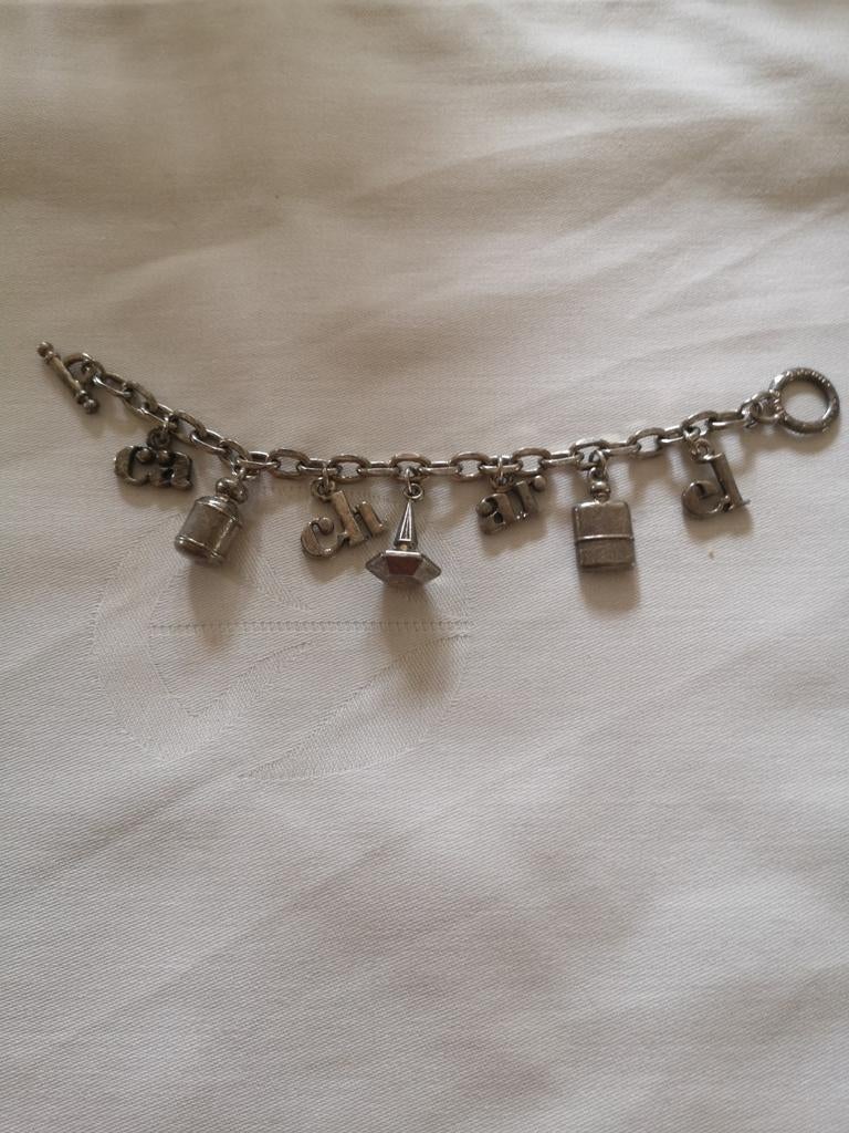 Oude metalen bedelarmband Cacharel, Ophalen of Verzenden, Zo goed als nieuw, Zilver, Overige materialen