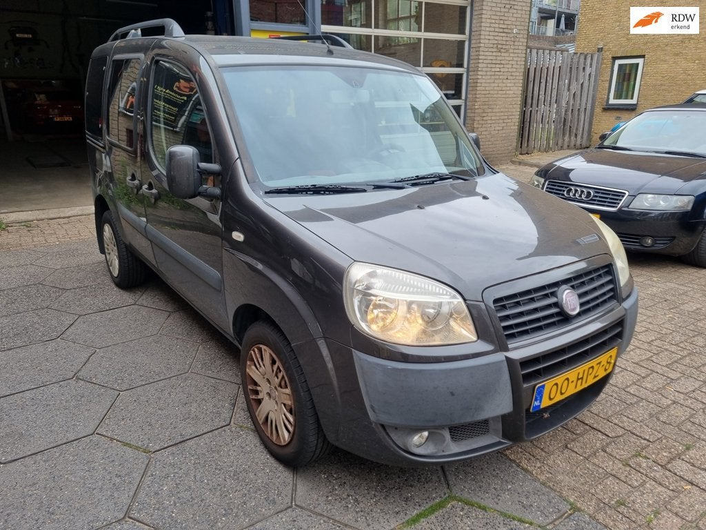 Fiat Doblò 1.4 Family, Auto's, Fiat, Voorwielaandrijving, Gebruikt, 4 cilinders, 7 stoelen