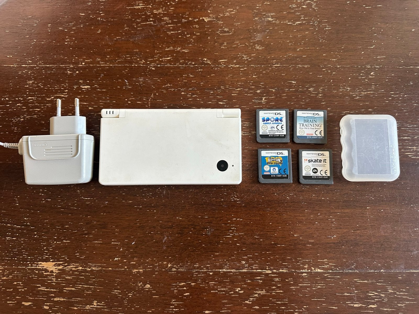 Nintendo DSI wit met 4 games en oplader, Spelcomputers en Games, Wit, Ophalen of Verzenden, DS Lite, Gebruikt