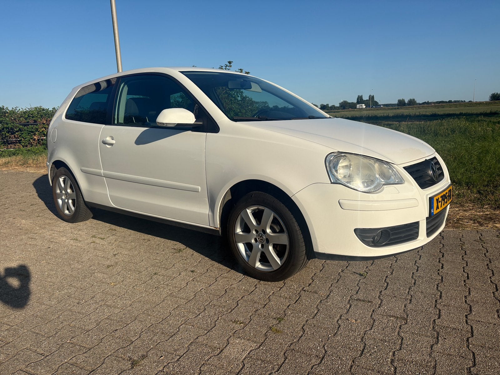 Volkswagen Polo 1.2 44KW 2008 Wit, Auto's, Voorwielaandrijving, Stof, 989 kg, 1198 cc