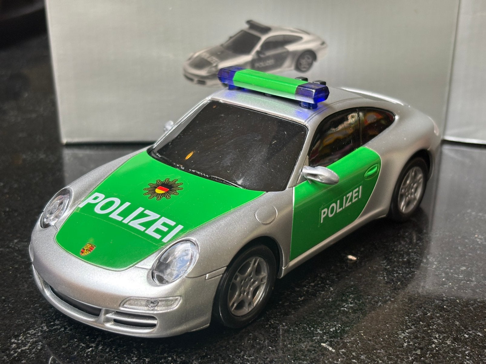 Porsche 911 (997) Polizei 1:24 Dickie, Ophalen of Verzenden, Zo goed als nieuw, Overige merken