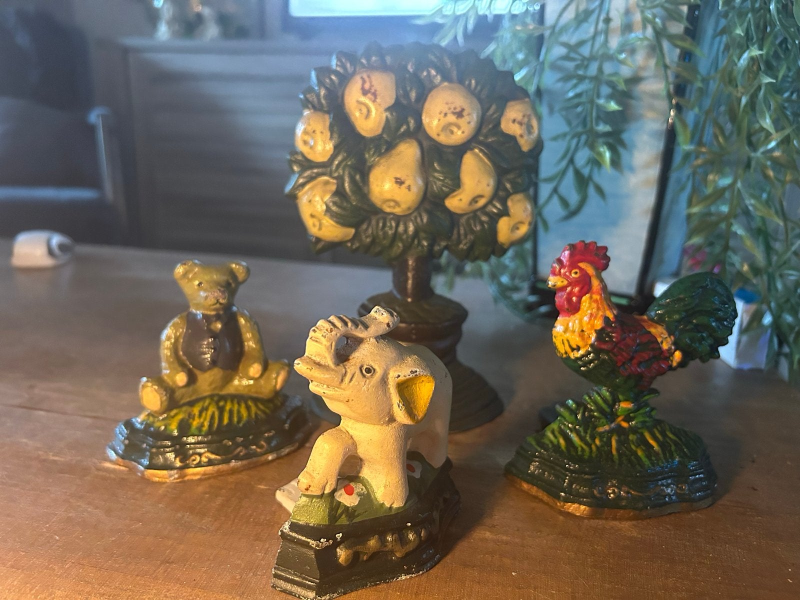 Set van 4 gietijzeren deurstopper/boekensteun figuren, Ophalen of Verzenden