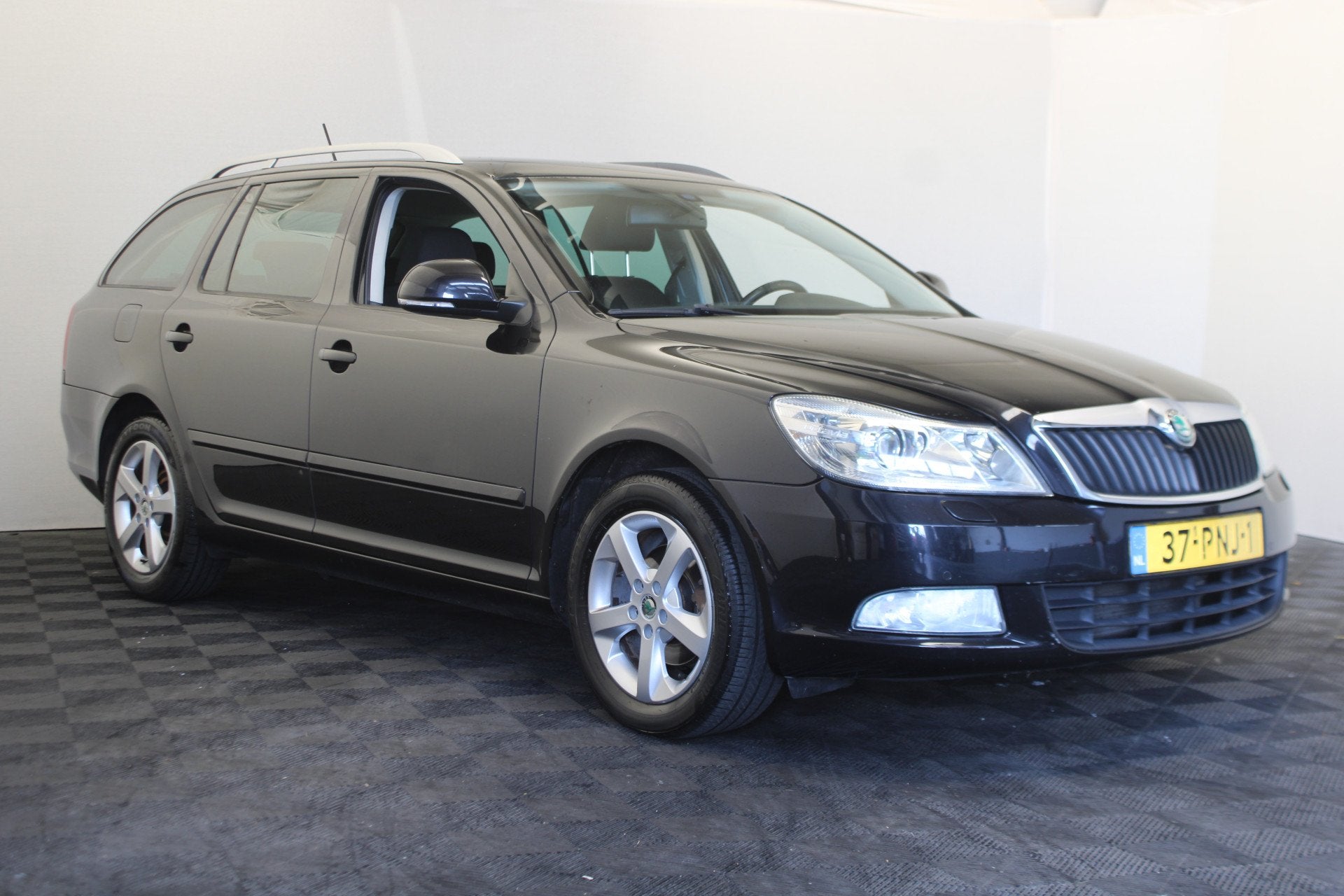 Skoda Octavia Combi 1.2 TSI Elegance Business Line, Auto's, Skoda, Euro 5, Stof, Gebruikt, 4 cilinders