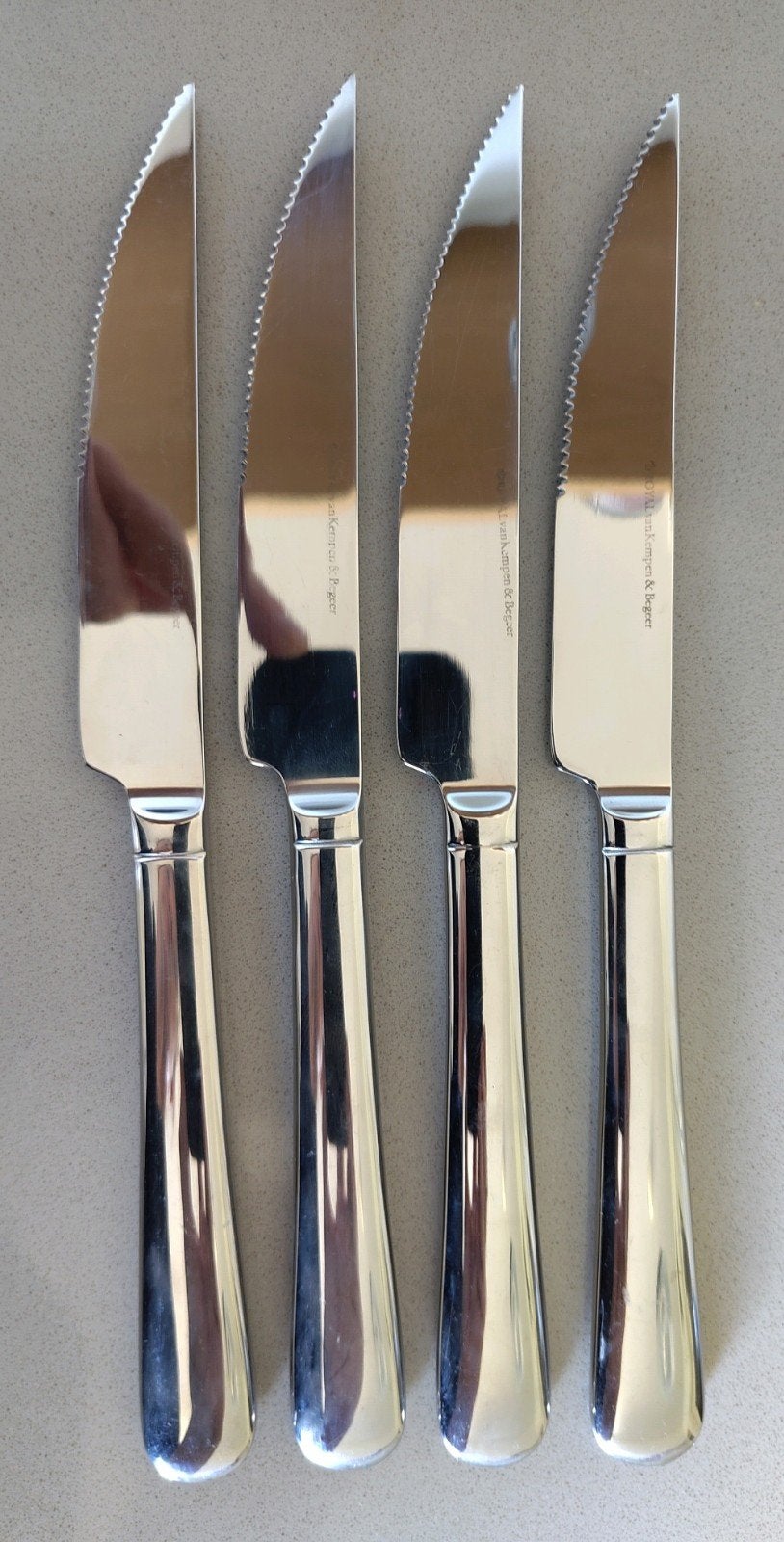 Royal van Kempen en Begeer 4 steakmessen, Ophalen of Verzenden, Zo goed als nieuw, Rvs of Chroom